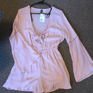Pink boho romper never worn